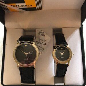 NIB His and Her watch set. Black and silver.